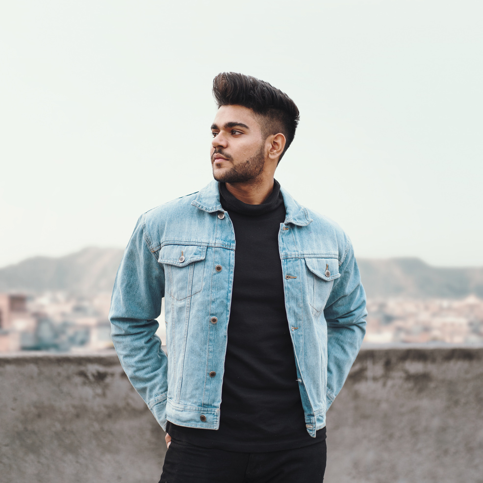 Man Wearing Blue Denim Jacket